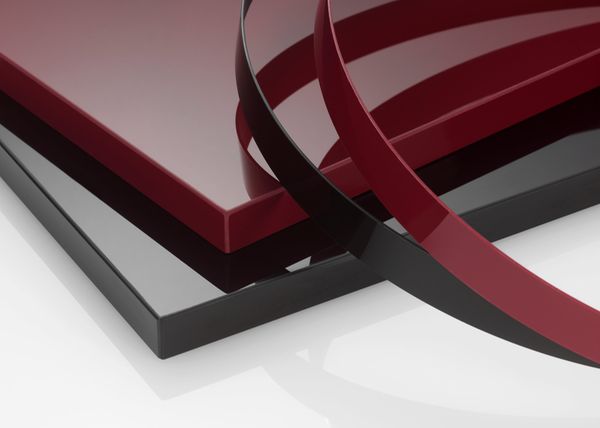 canto de pvc mirror, negro y carmin